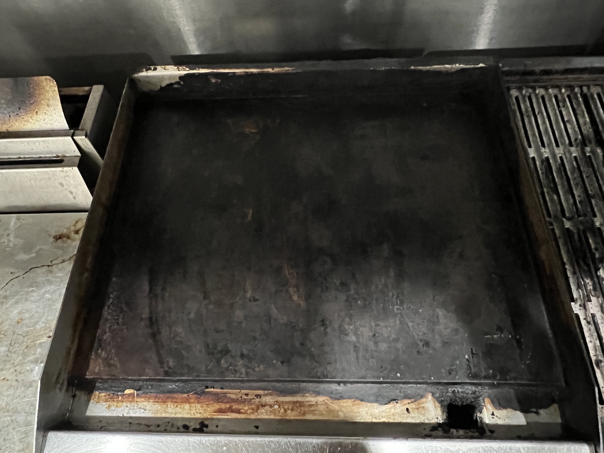 Commercial grill before cleaning